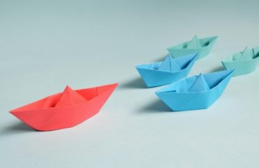 Paper Boats on Solid Surface