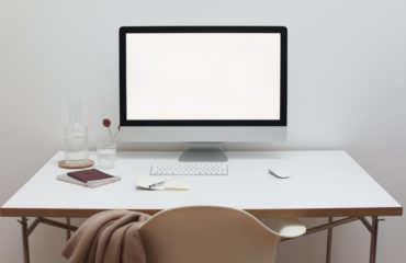 Free Stylish workspace with computer and simple furniture Stock Photo